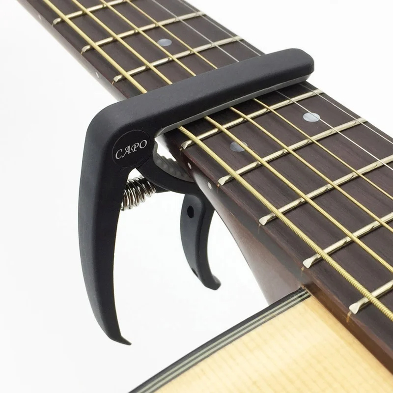 Plastic Guitar Capo for 6 Stri - Musical Instrument With Strings review and price