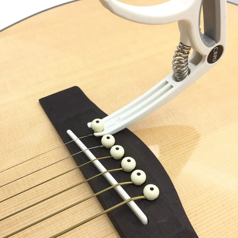 Plastic Guitar Capo for 6 Stri - Musical Instrument With Strings review and price