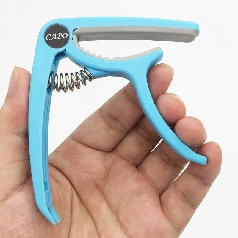 Plastic Guitar Capo for 6 Stri - Musical Instrument With Strings review and price